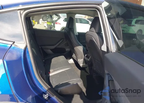 2023 Tesla Model Y Awd/Long Range Dual Motor All-Wheel Drive z USA, uszkodzony, nr VIN 7SAYGDEE9PA076287